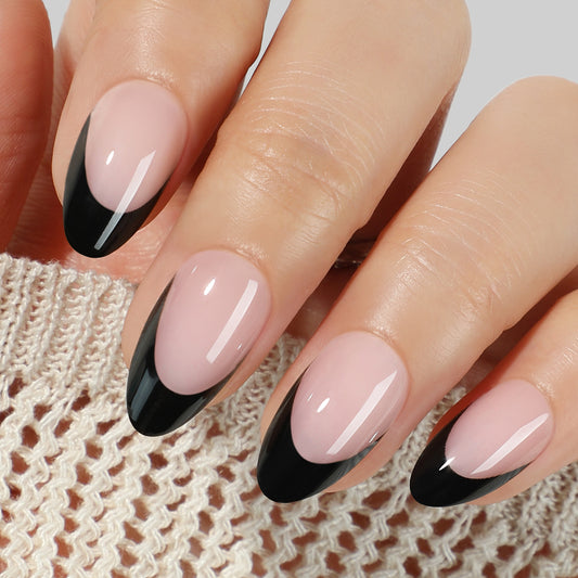 UNA GELLA black French tip press-on nails in short almond shape with soft gel finish, reusable and easy to apply.