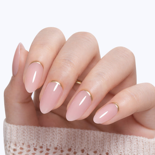 UNA GELLA soft gel press-on nails in nude pink with gold rim, almond shape, 16 sizes, perfect for elegant, easy-to-wear nail styles.