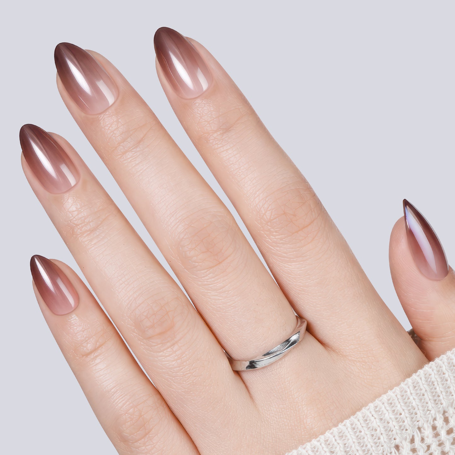 UNA GELLA reusable press-on nails in brown metallic gradient with short almond shape, ideal for DIY nail design.