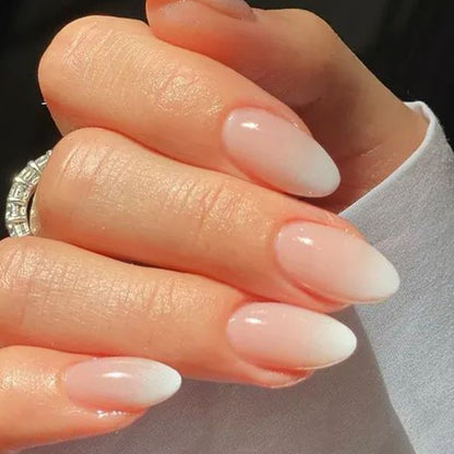 Short almond-shaped Ombre Soft Gel press-on nails by UNA GELLA, showcasing 16 sizes of stylish nail tips.