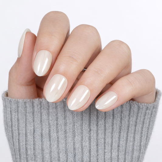 Reusable UNA GELLA silver chrome almond-shaped nail tips in a 32-pack, salon-grade press-on nails for DIY manicures.