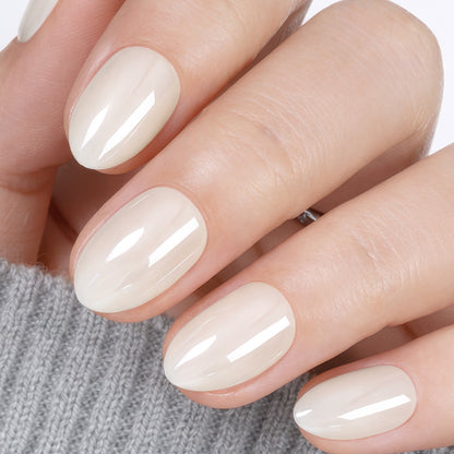 Silver chrome almond-shaped reusable nail tips by UNA GELLA, 32-piece salon-grade press-on gel nails for DIY manicure.