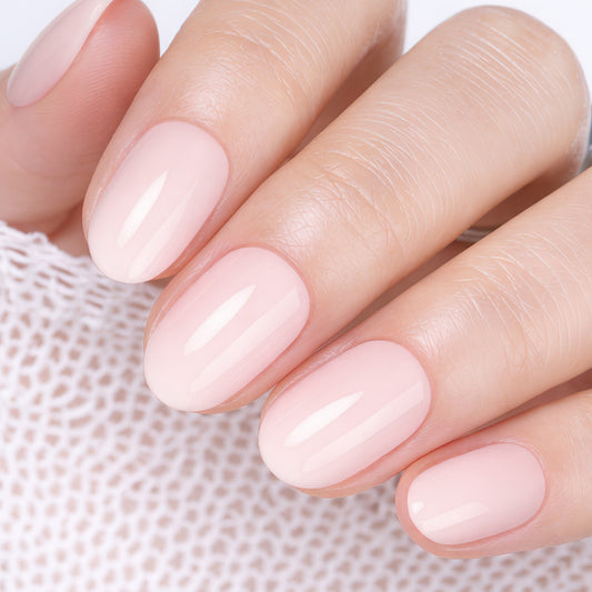 UNA GELLA soft gel press-on nails in nude pink, oval shape, 32-piece set with 16 sizes, reusable salon-grade nail tips.