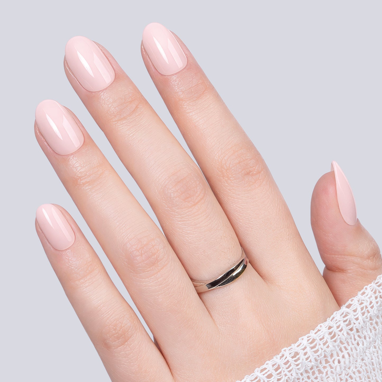 Reusable UNA GELLA soft gel press-on nail tips in nude pink oval shape, 16 sizes, salon-grade DIY manicure accessory