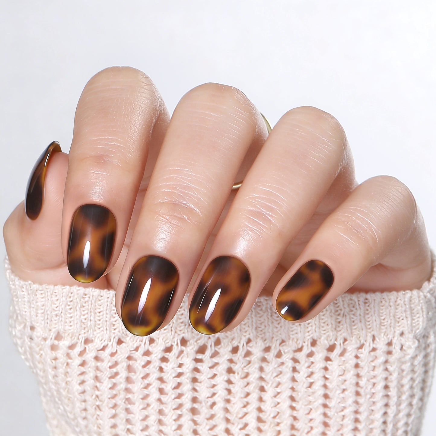 UNA GELLA Tortoise Shell soft gel press on nail tips in 16 sizes, reusable, round shape, DIY nail art, amber pattern