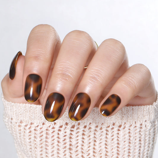 UNA GELLA Tortoise Shell soft gel press on nail tips in 16 sizes, reusable, round shape, DIY nail art, amber pattern
