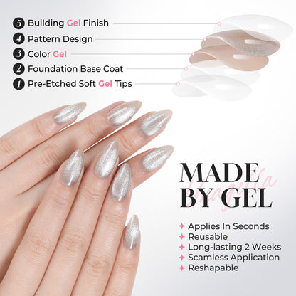 Silver cat eye almond-shaped press-on nails by UNA GELLA, 32-piece set with 16 sizes, reusable soft gel nail tips for DIY manicure.