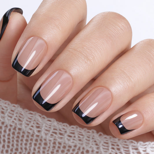 UNA GELLA 32-piece soft gel press-on nails set featuring black chrome finish, French style, short squoval shape.