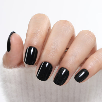 Short round black press on nails by UNA GELLA, soft gel, 32 pieces in 16 sizes, ideal for DIY nail art and quick manicures.