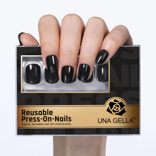 Short round black press-on nails by UNA GELLA, soft gel squoval design, 32 pieces in 16 sizes for DIY nail art.