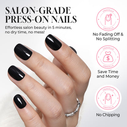 Short round black press-on nails by UNA GELLA, soft gel finish, 32 pieces in 16 sizes for DIY nail art and styling.