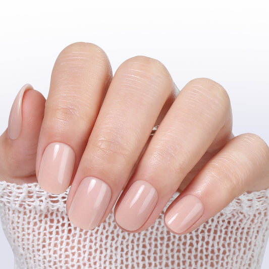 UNA GELLA short round press-on nails set with nude pink soft gel finish in 16 sizes, reusable squoval-soft nail design.