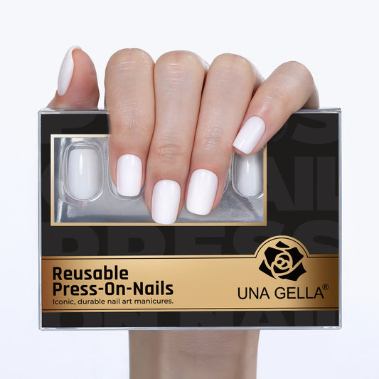 Set of 32 reusable UNA GELLA soft gel press-on nails in short squoval shape, white, with 16 sizes for salon-grade DIY manicures.